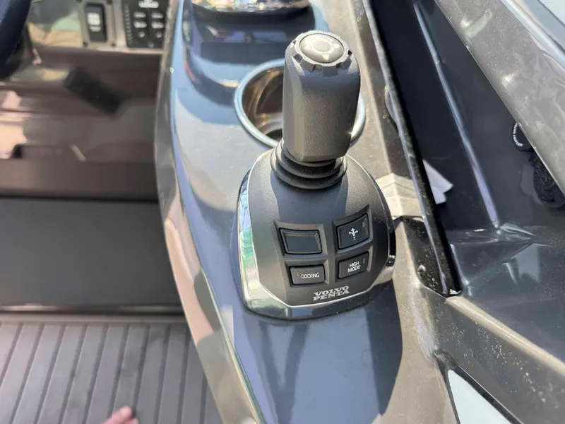 Slide: The Image of Joystick control on 2017 Monterey 328 Super Sport boat dashboard. - 11