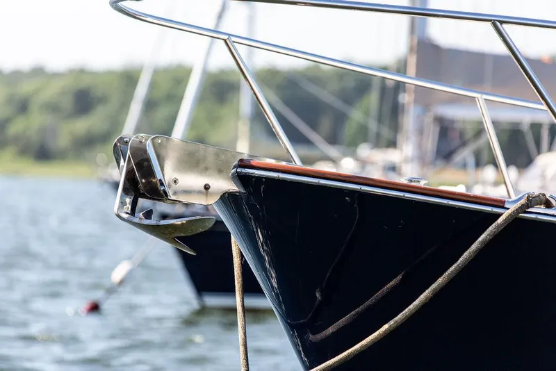 Slide: The Image of Close-up of 2014 Bruckmann Abaco 40 yacht bow with anchor, docked on calm water. - 15
