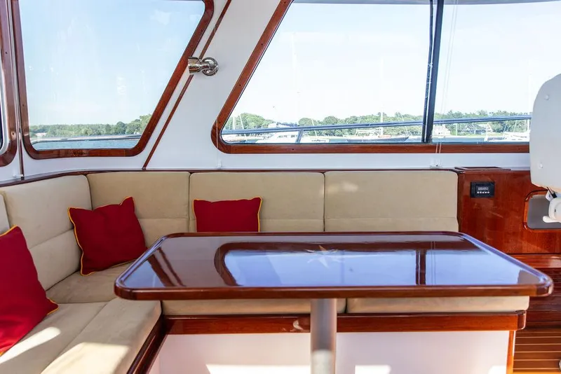Slide: The Image of Luxurious interior of 2014 Bruckmann Abaco 40 yacht with plush seating and wooden table. - 30