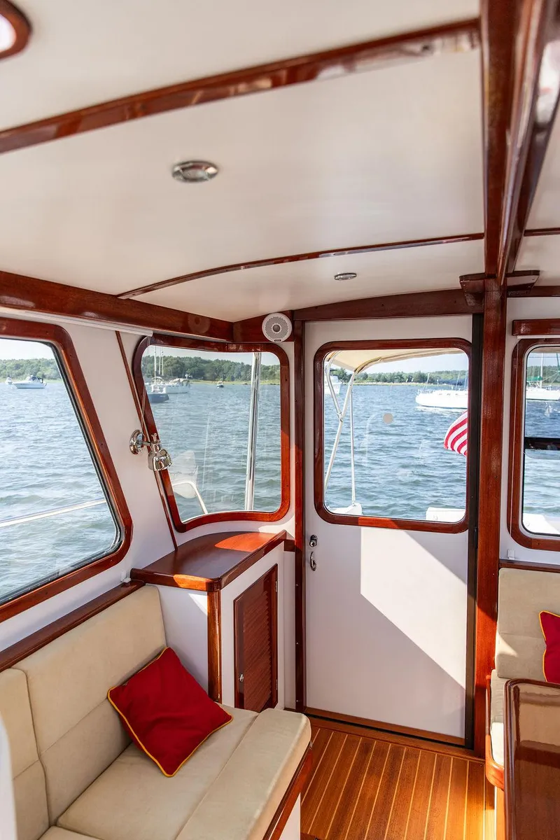 Slide: The Image of Interior of 2014 Bruckmann Abaco 40 yacht with wooden accents and lake view. - 36