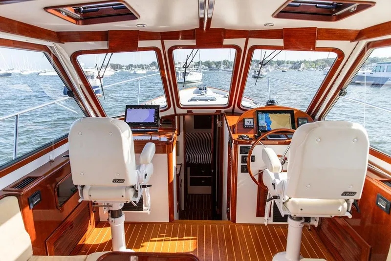 Slide: The Image of Interior of 2014 Bruckmann Abaco 40 yacht with navigation equipment and captain's chairs. - 37