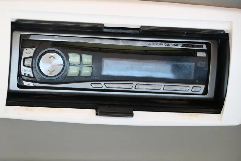 Slide: The Image of Alpine CD receiver in a 2007 Bennington 2577 RFi boat dashboard. - 26