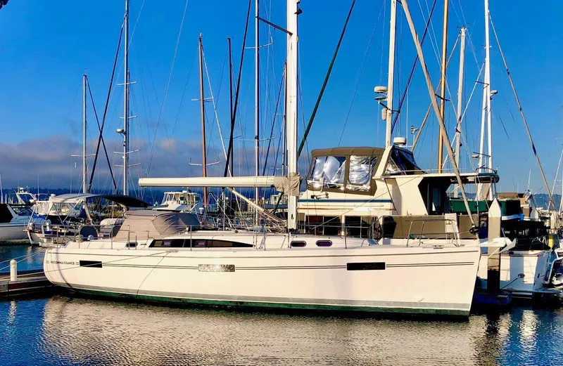The Image of 2019 Catalina 425 sailboat docked in a marina under clear blue skies. - 0