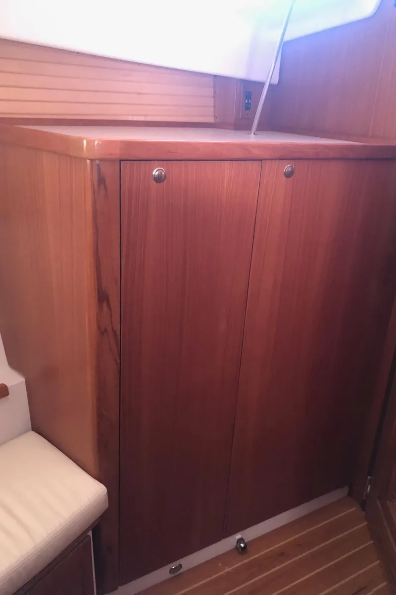 Slide: The Image of Wooden cabinet interior of 2019 Catalina 425 yacht with sleek design and polished finish. - 10