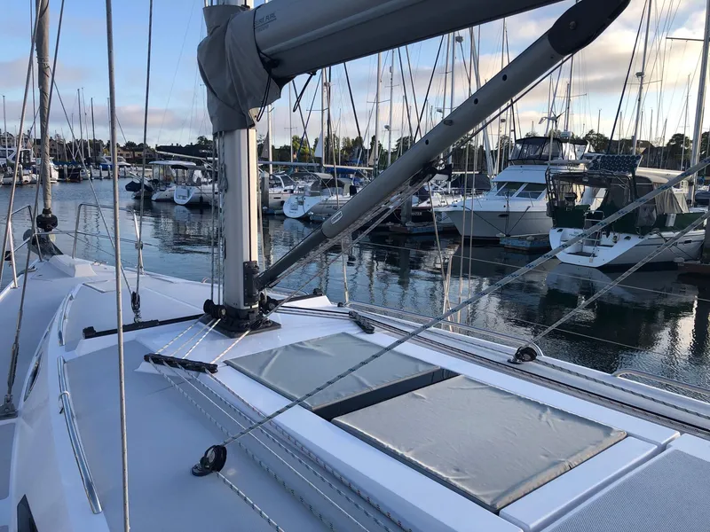 Slide: The Image of Sailboat Catalina 425, 2019 model, docked in a marina with other boats. - 19