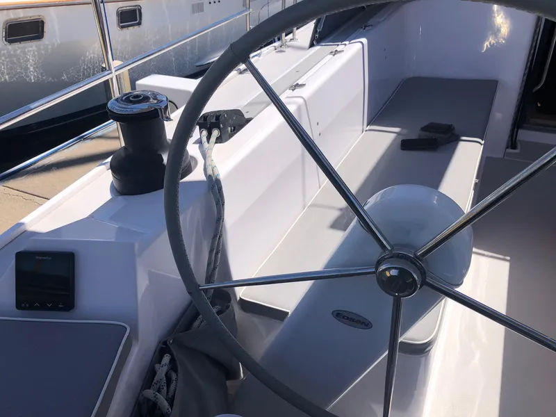 Slide: The Image of Steering wheel and cockpit of 2019 Catalina 425 sailboat, featuring modern design and equipment. - 29