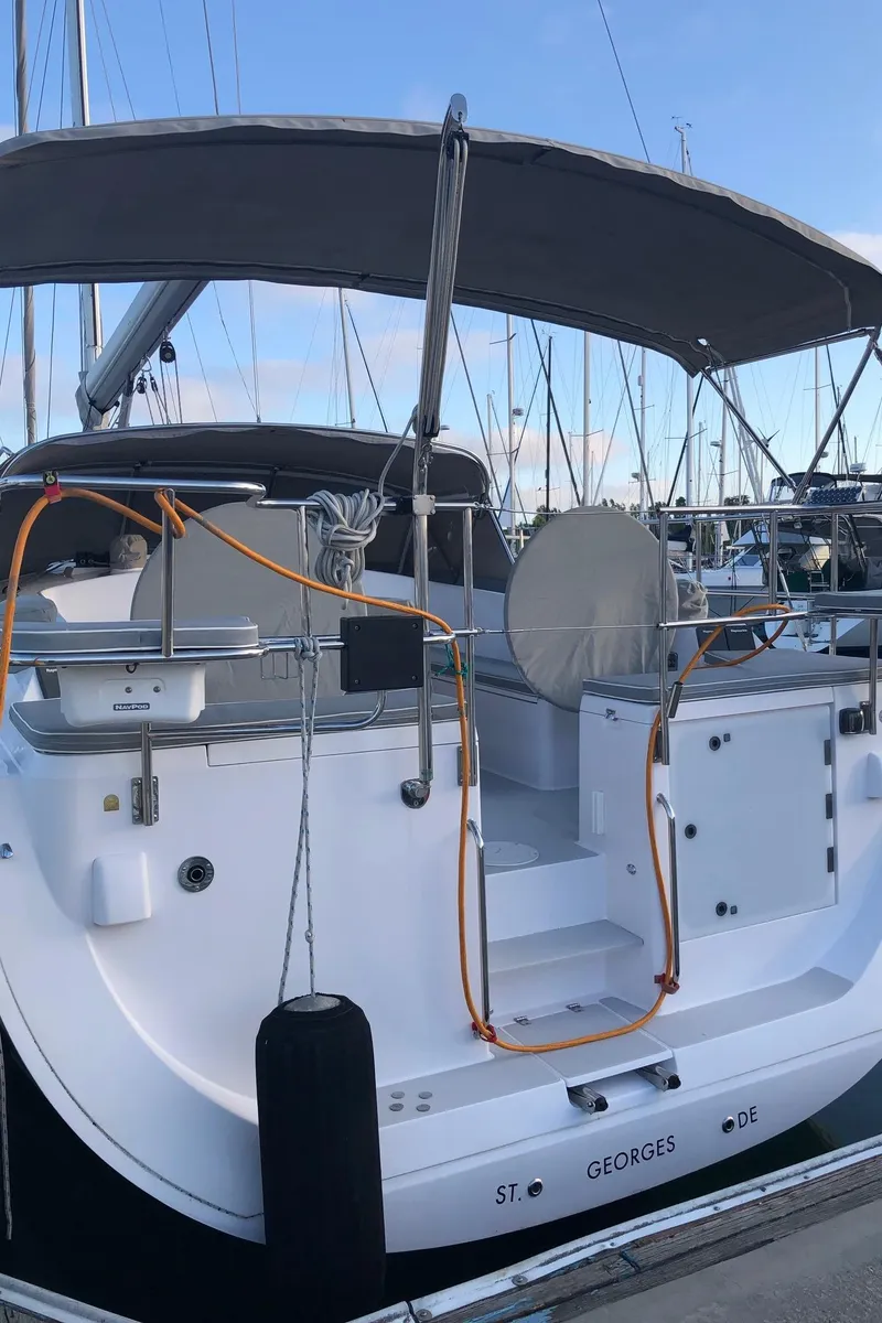 Slide: The Image of 2019 Catalina 425 yacht docked at marina, featuring spacious deck and modern design. - 32