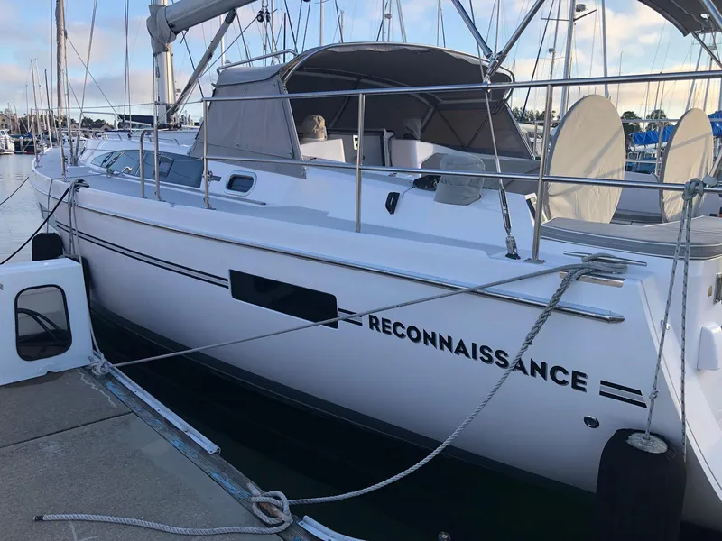Slide: The Image of 2019 Catalina 425 sailboat named "Reconnaissance" docked at a marina. - 33
