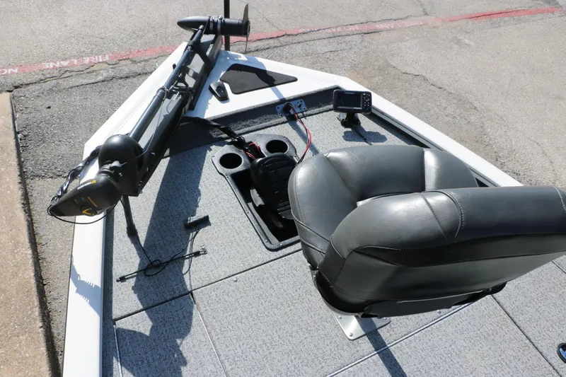 Slide: The Image of 2022 Tracker Pro Team 195 TXW Tournament Edition boat interior with seat and equipment. - 16