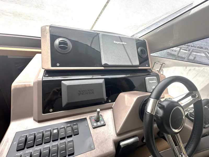 Slide: The Image of Helm of 2016 Galeon 380 Fly yacht with Raymarine and Volvo Penta controls. - 11