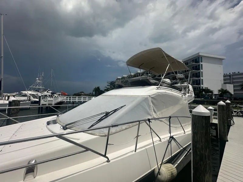 Slide: The Image of 2016 Galeon 380 Fly yacht docked at marina under cloudy sky. - 24