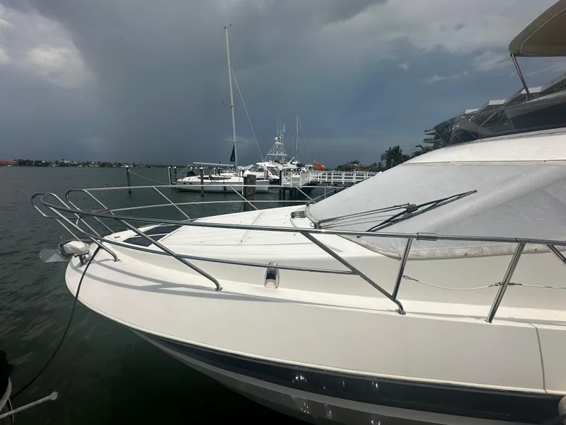 Slide: The Image of Galeon 380 Fly yacht docked at marina, cloudy sky, 2016 model. - 25