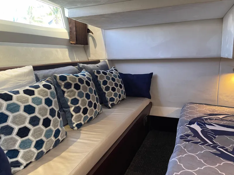 Slide: The Image of Interior of 2016 Galeon 380 Fly yacht with hexagonal patterned cushions. - 5