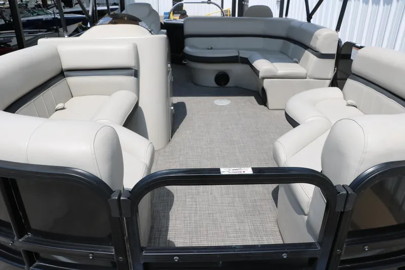 Slide: The Image of 2019 Berkshire 20RFC CTS pontoon boat interior with plush seating and spacious layout. - 14