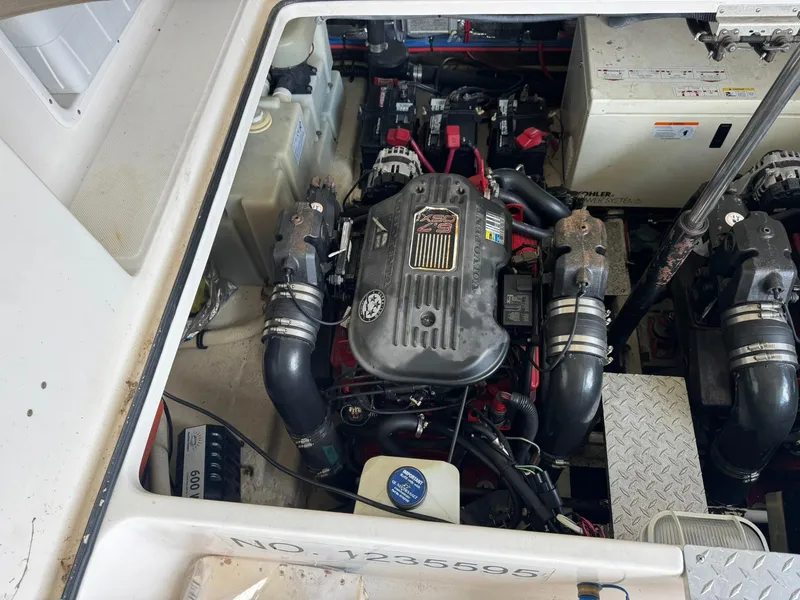 Slide: The Image of Engine compartment of a 2006 Regal 3360 Window Express boat, featuring a Volvo Penta engine. - 40