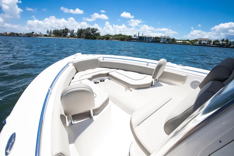 Slide: The Image of 2021 Key West 219 FS boat interior on calm water, sunny day. - 7