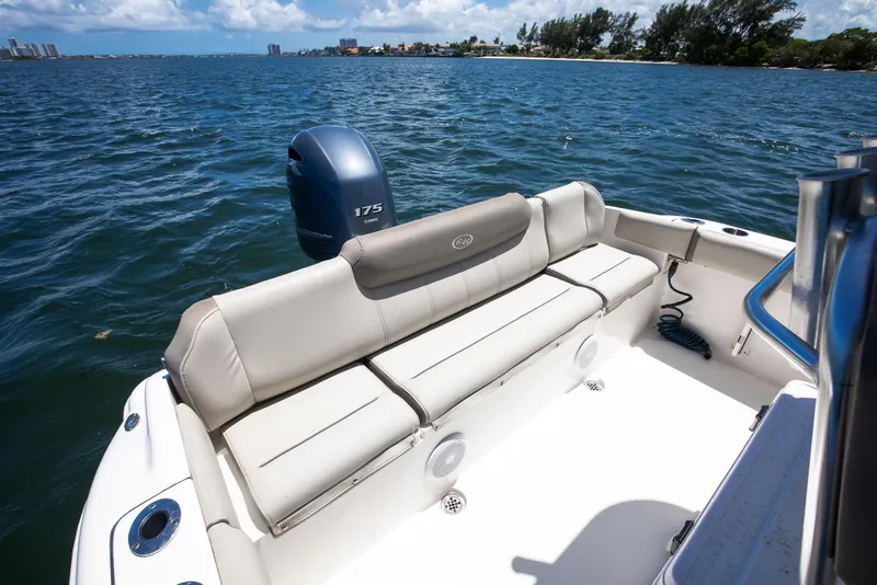 Slide: The Image of 2021 Key West 219 FS boat with Yamaha 175 engine on open water. - 9