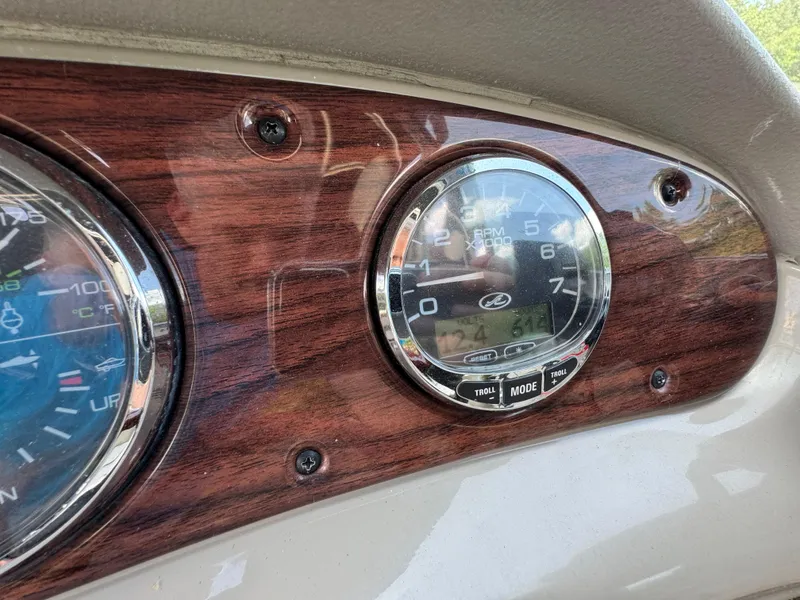 Slide: The Image of Dashboard of a 2006 Sea Ray 270 Sundeck boat with RPM gauge. - 29