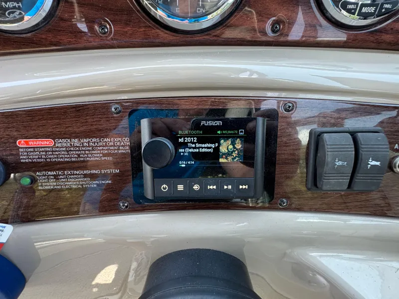 Slide: The Image of Dashboard of a 2006 Sea Ray 270 Sundeck with Fusion stereo system. - 30