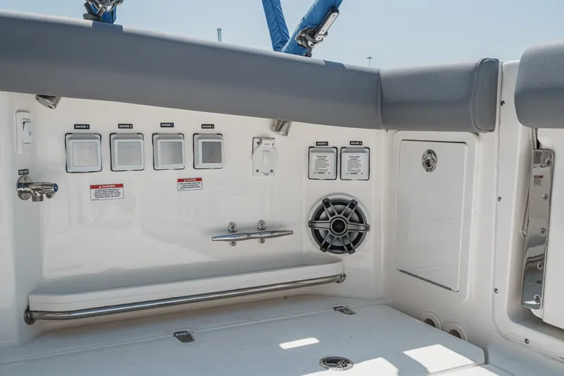 Slide: The Image of 2024 Boston Whaler 380 Realm boat interior with control panel and speaker. - 44