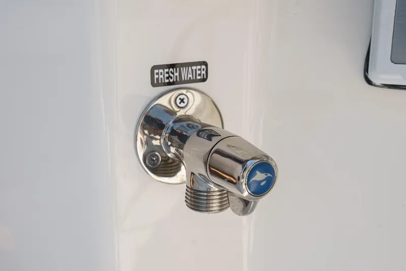 Slide: The Image of Fresh water faucet on 2024 Boston Whaler 380 Realm boat. - 45