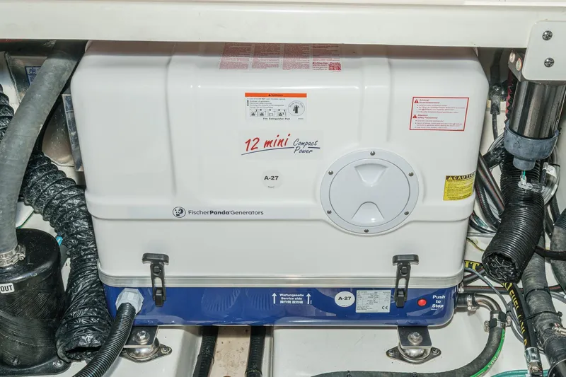 Slide: The Image of Engine room of 2024 Boston Whaler 380 Realm with Fischer Panda generator. - 80