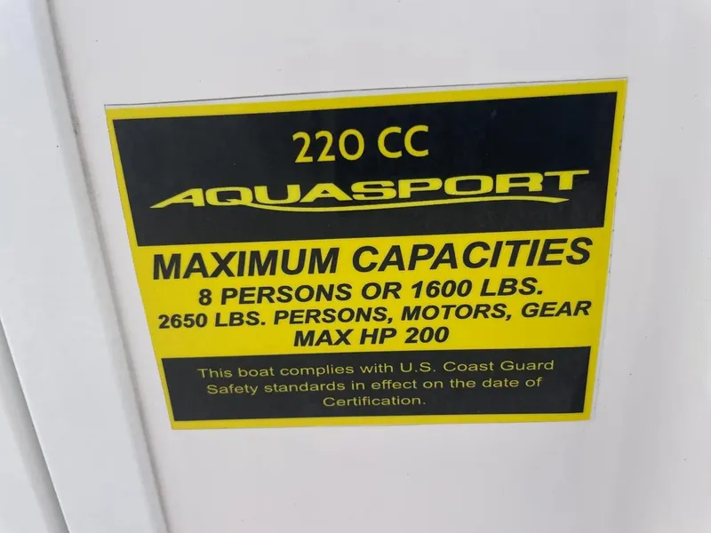 Slide: The Image of 2023 Aquasport 22CC capacity label, 8 persons or 1600 lbs, max 200 HP. - 19