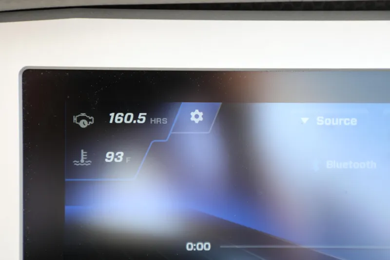 Slide: The Image of Dashboard display of a 2021 Centurion Ri245 showing 160.5 engine hours and 93°F temperature. - 13