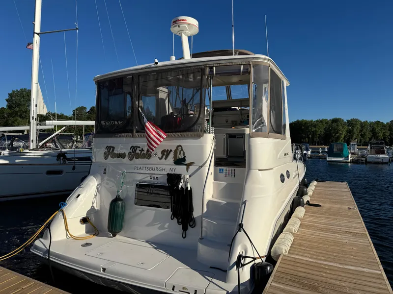 Slide: The Image of 1998 Sea Ray 420 Aft Cabin yacht docked at marina, Plattsburgh, NY. - 4
