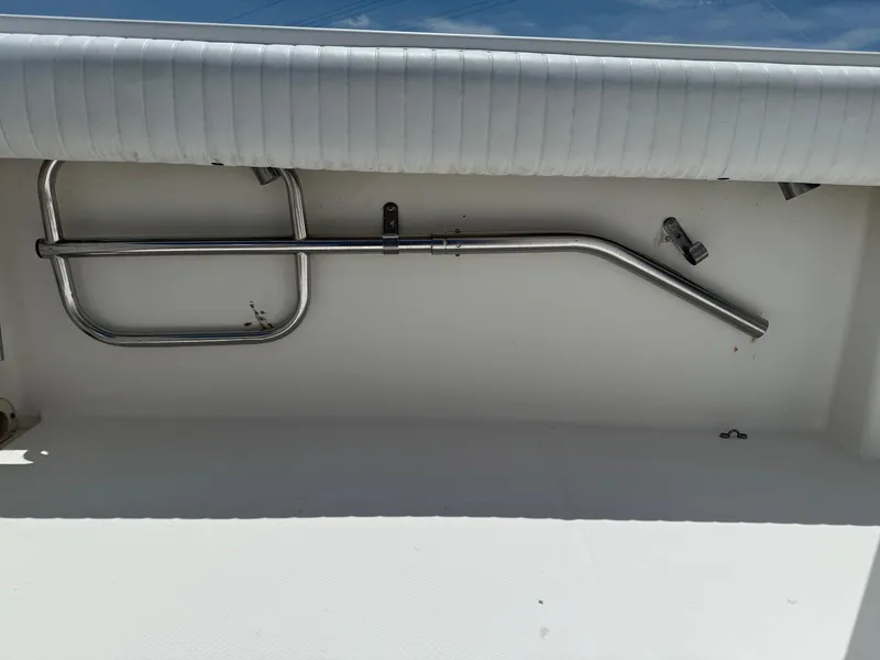 Slide: The Image of 2006 Regulator 26 Forward Seating boat interior with stainless steel railing. - 26