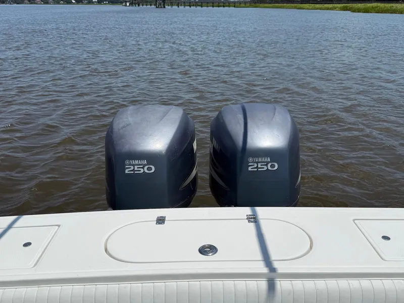 Slide: The Image of Twin Yamaha 250 outboard motors on a 2006 Regulator 26 Forward Seating boat. - 9