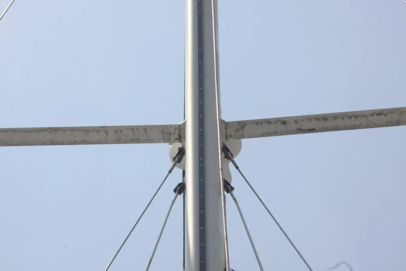 Slide: The Image of Mast and rigging of 2004 Pacific Seacraft Crealock 40 sailboat against clear sky. - 13
