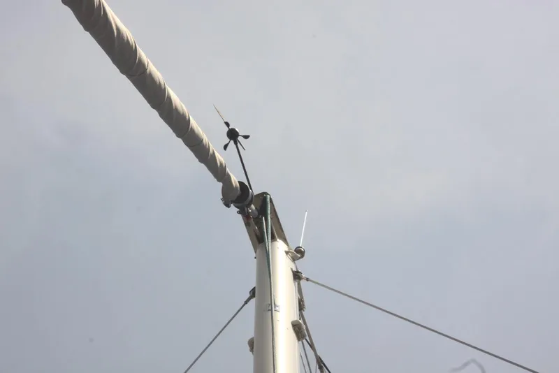 Slide: The Image of Mast of 2004 Pacific Seacraft Crealock 40 sailboat against clear sky. - 15