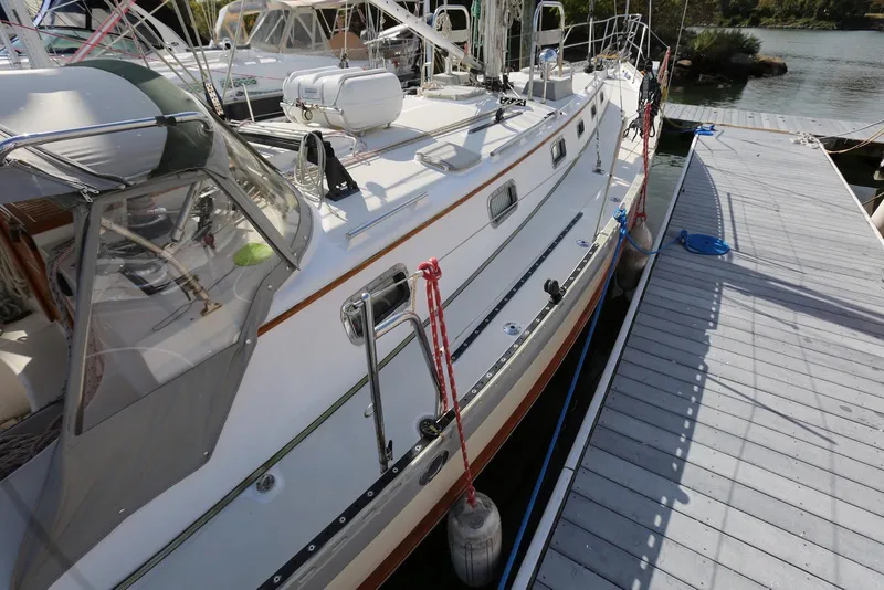 Slide: The Image of 2004 Pacific Seacraft Crealock 40 yacht docked at marina. - 29