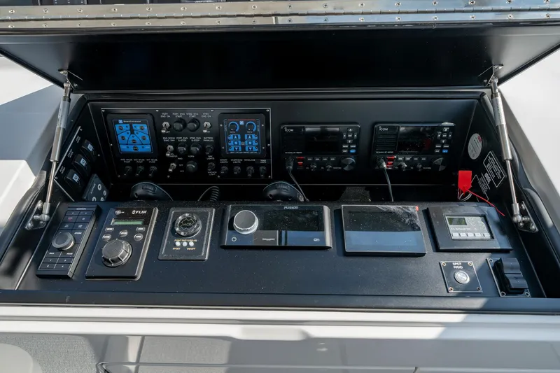 Slide: The Image of Control panel of 2024 Viking 48 Sport Tower with advanced navigation and communication systems. - 42
