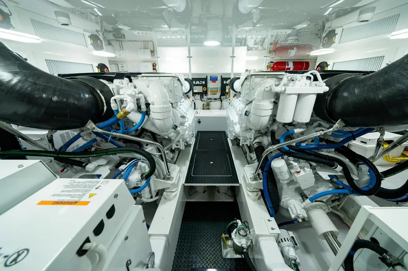 Slide: The Image of Engine room of 2024 Viking 48 Sport Tower, showcasing dual powerful engines. - 71