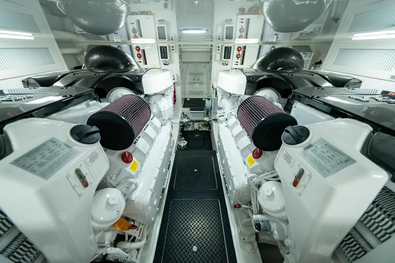 Slide: The Image of Engine room of 2024 Viking 48 Sport Tower yacht, featuring a powerful MAN engine. - 72