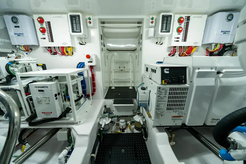 Slide: The Image of Engine room of 2024 Viking 48 Sport Tower, showcasing advanced equipment and systems. - 73