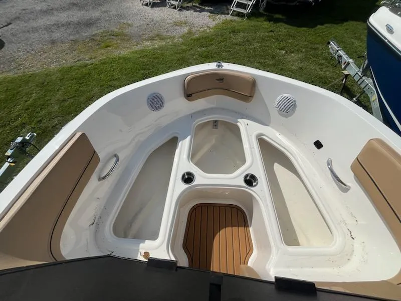 Slide: The Image of 2025 Bayliner VR6 Bowrider OB interior with spacious seating and modern design. - 17