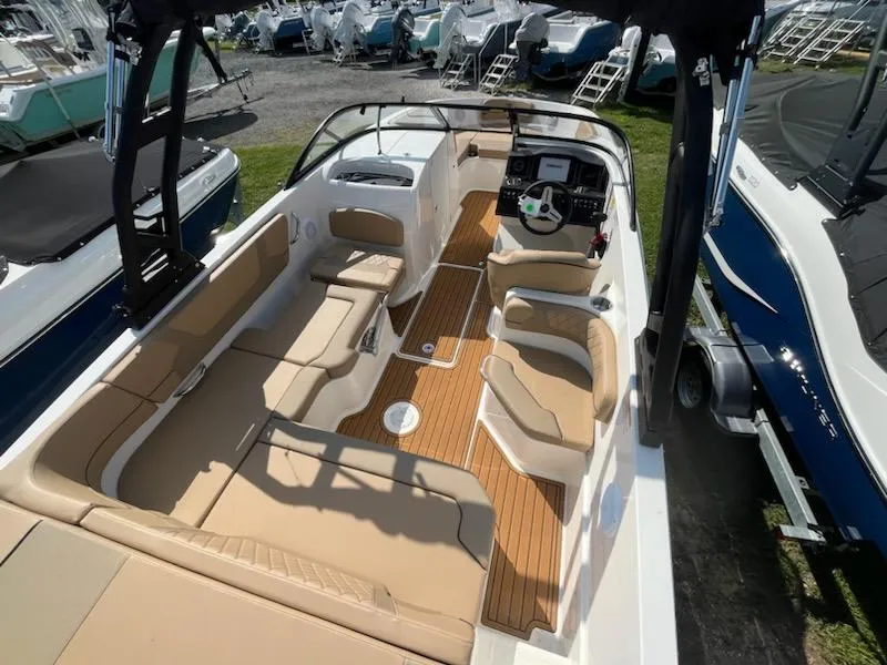 Slide: The Image of 2025 Bayliner VR6 Bowrider OB with spacious seating and modern interior design. - 5