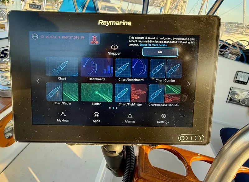 Slide: The Image of Raymarine navigation display on a 1981 Bristol 35.5 sailboat, showing chart and radar options. - 18