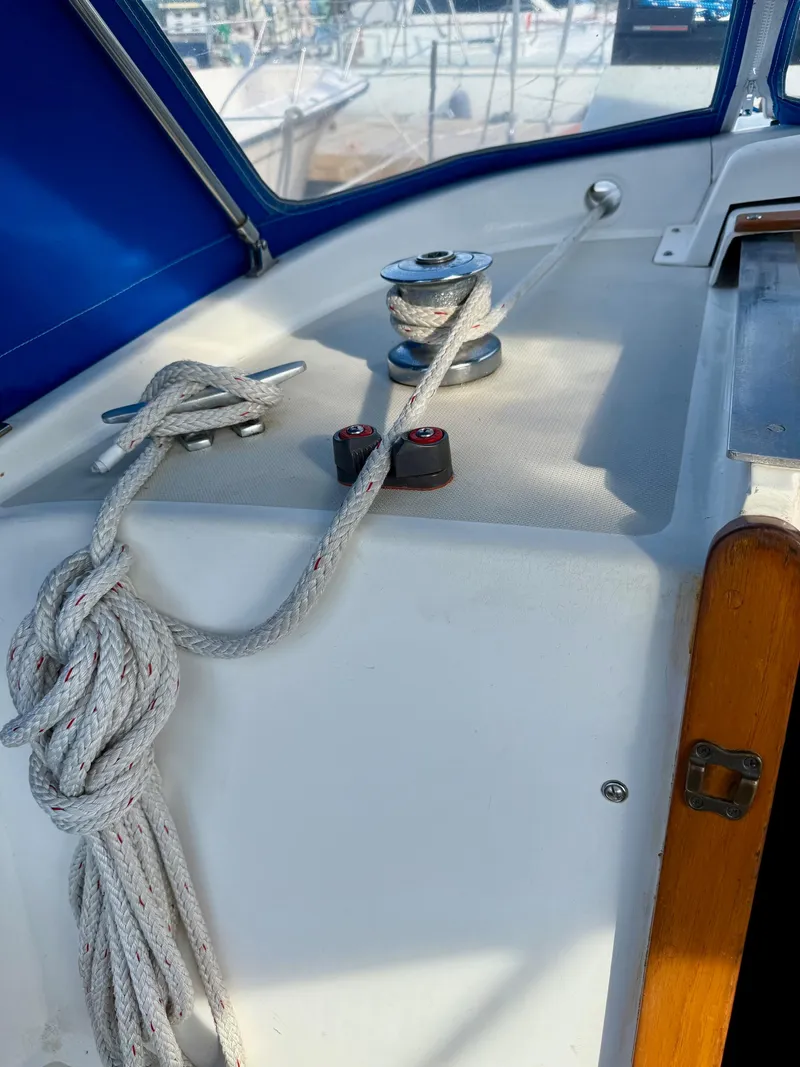 Slide: The Image of Deck of 1981 Bristol 35.5 sailboat with ropes and winch. - 20