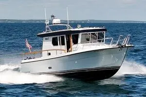 Slide: The Image of 2022 Targa 32 boat cruising on open water, showcasing sleek design and performance. - 2