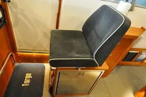 Slide: The Image of Luxury seating in 2022 Targa 32 boat interior, featuring sleek design and comfort. - 25