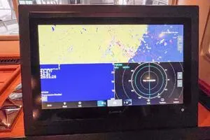 Slide: The Image of Boat navigation system display on a 2022 Targa 32, showing radar and map interface. - 29