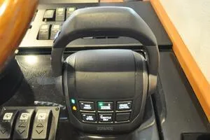 Slide: The Image of Control panel of a 2022 Targa 32 boat with various buttons and switches. - 30
