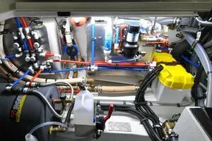 Slide: The Image of Engine room of 2022 Targa 32 boat with complex wiring and components. - 40