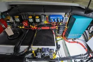 Slide: The Image of Engine compartment of a 2022 Targa 32 boat, showcasing wiring and electrical components. - 41