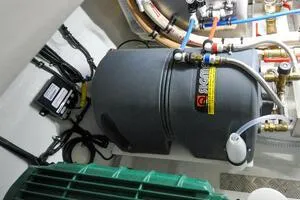 Slide: The Image of Engine room of 2022 Targa 32 boat with equipment and wiring. - 42