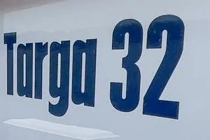 Slide: The Image of Targa 32 boat logo, 2022 model, bold blue lettering on white background. - 45